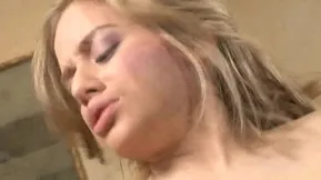 Blonde and charming Summer Silver's cheerleader look is irresistible