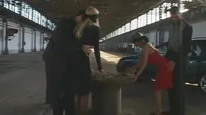 A hot group sex session with three European blondes and a band of men