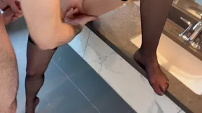 Marital sex with of hardcore standing doggystyle and socks on chin