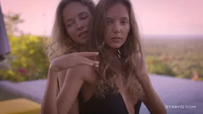 Small perky breasts of the blonde females Katya and Danica wearing bras.