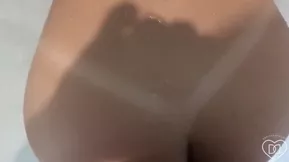 All natural beauty gets damp in the shower scene in 720p.