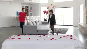 Beautiful woman with oiled up body gets some pleasure in her kitchen