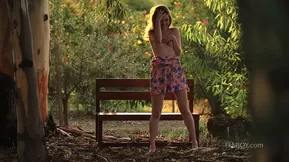 Solo set by a beautiful woman in a erotic poses at a beautiful location.