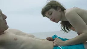 Two girls are having an experience with a guy in this explicit video