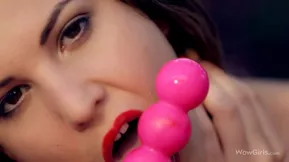 A gorgeous blonde the stunning Candy Sweet masturbates herself with a toy in a captivating solo scene