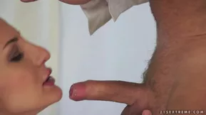 A white girl enjoying a hot cowgirl ride with a young guy on the couch ends up in a fantastic climax