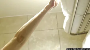 Blonde beauty Dana DeArmond fucked in a hot golden shower scene hiding her jewels