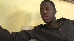 A young African American man has a pleasing encounter with his stepmom